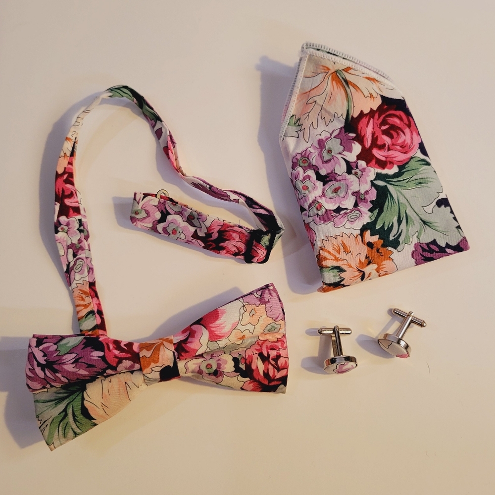 Bow tie set, pre-tied tie, pocket square, and cuff links plum, pinks, and beige.
